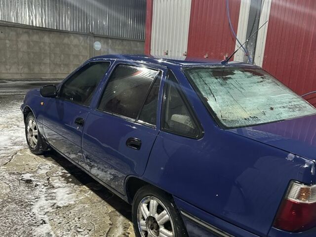 Синий Дэу Нексия, объемом двигателя 1.5 л и пробегом 250 тыс. км за 1500 $, фото 3 на Automoto.ua