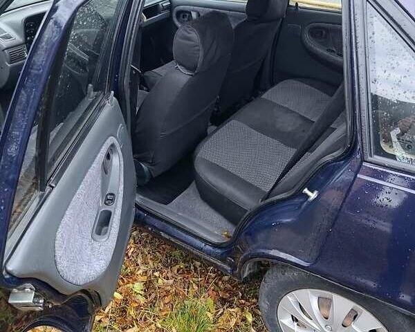 Синій Деу Нексія, об'ємом двигуна 1.5 л та пробігом 153 тис. км за 1450 $, фото 8 на Automoto.ua