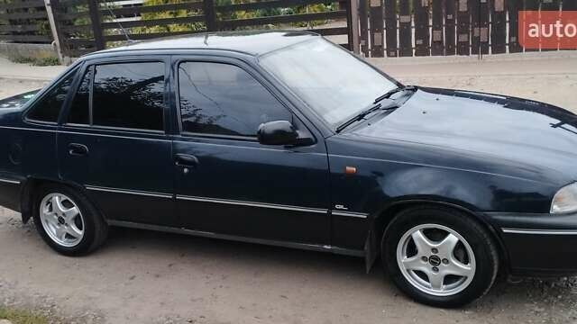 Синій Деу Нексія, об'ємом двигуна 1.5 л та пробігом 218 тис. км за 1650 $, фото 8 на Automoto.ua