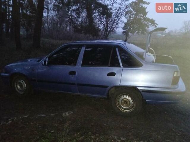 Синій Деу Нексія, об'ємом двигуна 1.5 л та пробігом 281 тис. км за 700 $, фото 2 на Automoto.ua