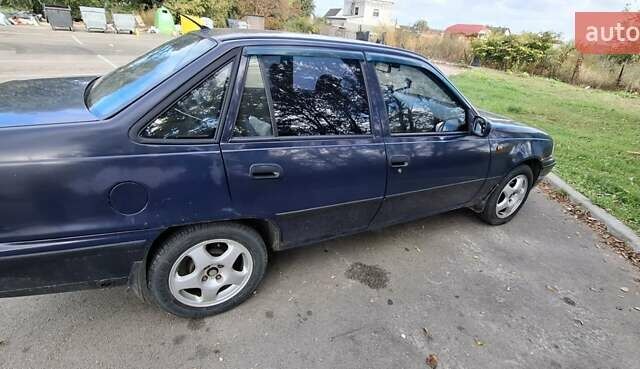 Синий Дэу Нексия, объемом двигателя 1.5 л и пробегом 159 тыс. км за 1150 $, фото 9 на Automoto.ua