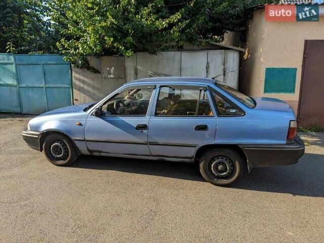 Синій Деу Нексія, об'ємом двигуна 1.5 л та пробігом 156 тис. км за 2000 $, фото 1 на Automoto.ua