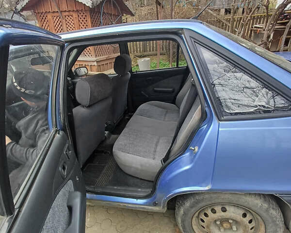 Синий Дэу Нексия, объемом двигателя 1.6 л и пробегом 200 тыс. км за 1625 $, фото 2 на Automoto.ua