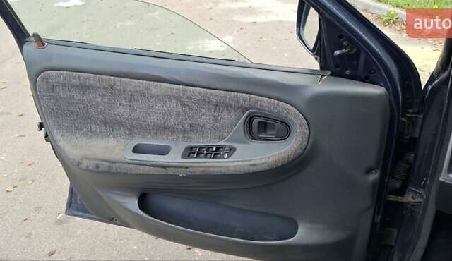 Синий Дэу Нексия, объемом двигателя 1.5 л и пробегом 159 тыс. км за 1150 $, фото 7 на Automoto.ua