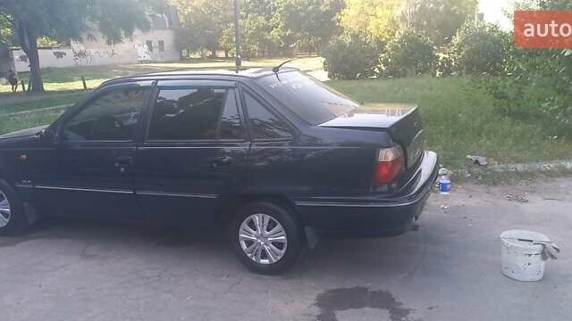 Синий Дэу Нексия, объемом двигателя 1.5 л и пробегом 350 тыс. км за 1750 $, фото 2 на Automoto.ua