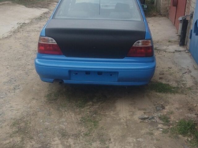 Синий Дэу Нексия, объемом двигателя 1.6 л и пробегом 200 тыс. км за 1600 $, фото 2 на Automoto.ua