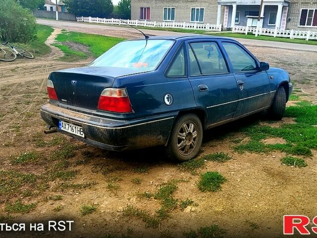 Синий Дэу Нексия, объемом двигателя 1.5 л и пробегом 303 тыс. км за 1500 $, фото 2 на Automoto.ua