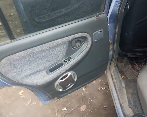 Синій Деу Нексія, об'ємом двигуна 1.5 л та пробігом 200 тис. км за 1000 $, фото 5 на Automoto.ua