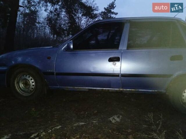 Синій Деу Нексія, об'ємом двигуна 1.5 л та пробігом 281 тис. км за 700 $, фото 4 на Automoto.ua