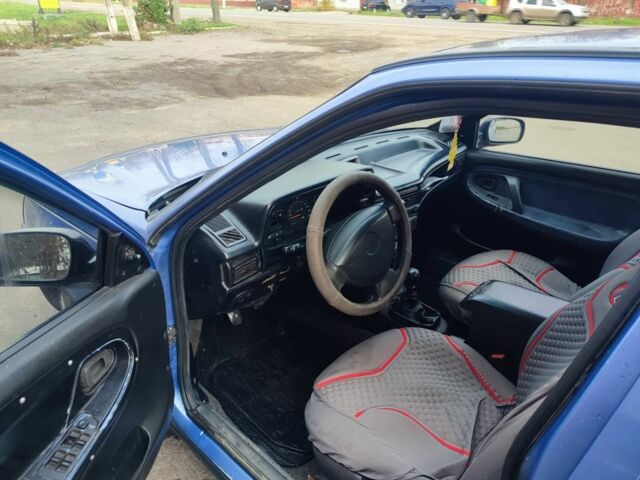 Синий Дэу Нексия, объемом двигателя 1.5 л и пробегом 250 тыс. км за 1050 $, фото 6 на Automoto.ua