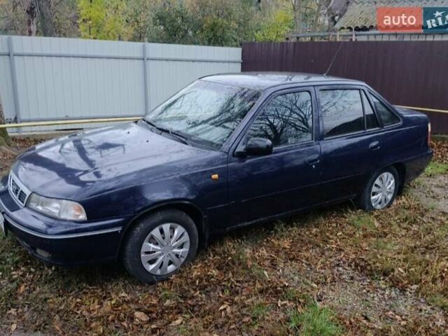 Синій Деу Нексія, об'ємом двигуна 1.5 л та пробігом 153 тис. км за 1450 $, фото 4 на Automoto.ua
