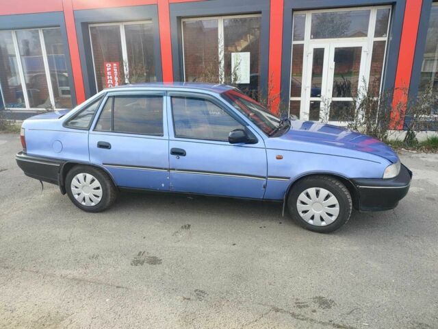 Синий Дэу Нексия, объемом двигателя 1.5 л и пробегом 250 тыс. км за 1050 $, фото 3 на Automoto.ua