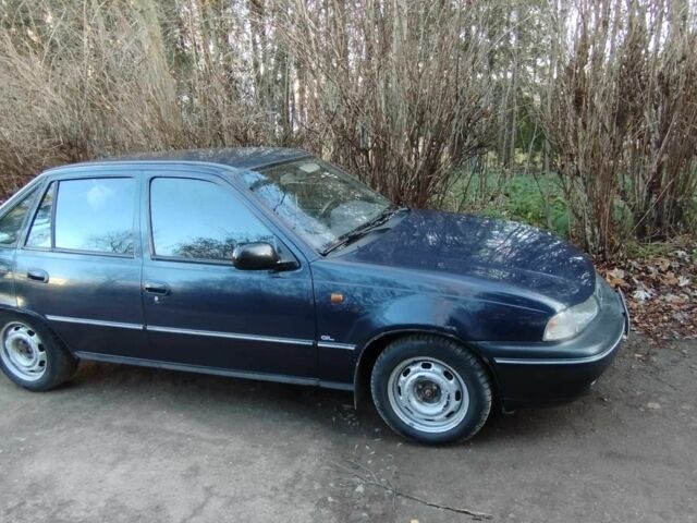 Синий Дэу Нексия, объемом двигателя 1.5 л и пробегом 218 тыс. км за 1650 $, фото 3 на Automoto.ua