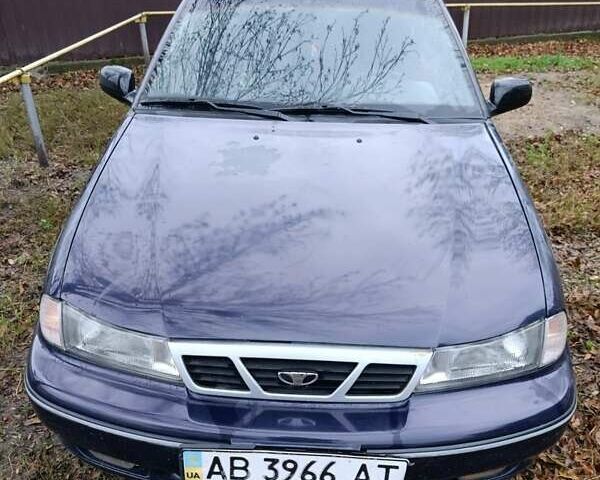 Синій Деу Нексія, об'ємом двигуна 1.5 л та пробігом 153 тис. км за 1450 $, фото 1 на Automoto.ua