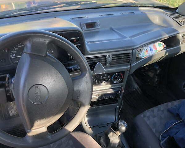 Синій Деу Нексія, об'ємом двигуна 1.6 л та пробігом 366 тис. км за 1150 $, фото 3 на Automoto.ua