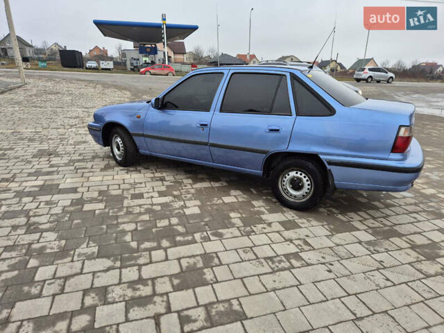 Синий Дэу Нексия, объемом двигателя 1.5 л и пробегом 242 тыс. км за 1999 $, фото 12 на Automoto.ua