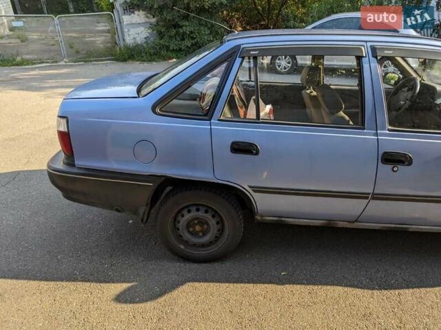 Синій Деу Нексія, об'ємом двигуна 1.5 л та пробігом 156 тис. км за 2000 $, фото 3 на Automoto.ua