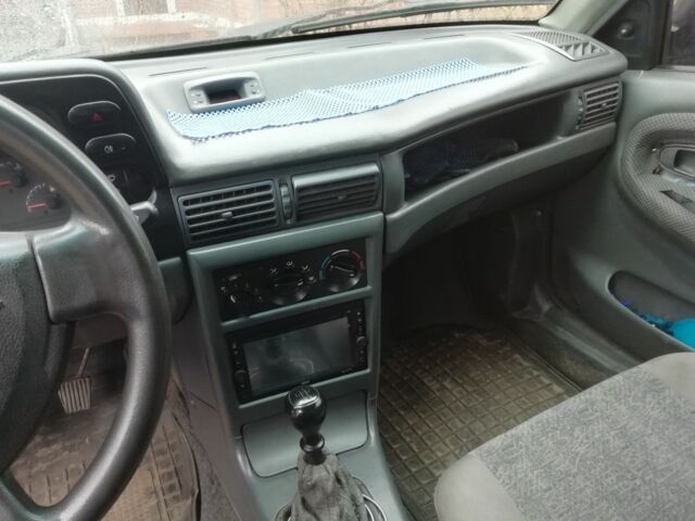 Синий Дэу Нексия, объемом двигателя 1.5 л и пробегом 190 тыс. км за 1500 $, фото 6 на Automoto.ua