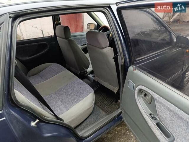 Синій Деу Нексія, об'ємом двигуна 1.5 л та пробігом 195 тис. км за 1000 $, фото 4 на Automoto.ua