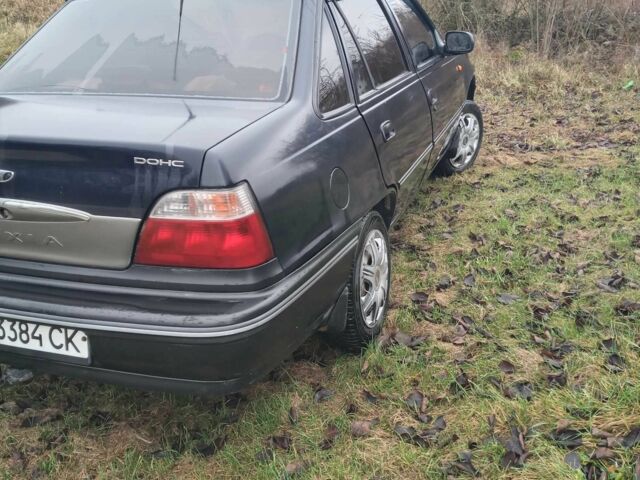 Синій Деу Нексія, об'ємом двигуна 1.5 л та пробігом 210 тис. км за 1700 $, фото 1 на Automoto.ua