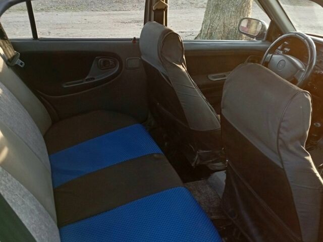 Синій Деу Нексія, об'ємом двигуна 1.5 л та пробігом 187 тис. км за 1233 $, фото 7 на Automoto.ua