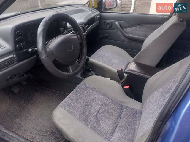 Синий Дэу Нексия, объемом двигателя 1.5 л и пробегом 189 тыс. км за 2400 $, фото 4 на Automoto.ua