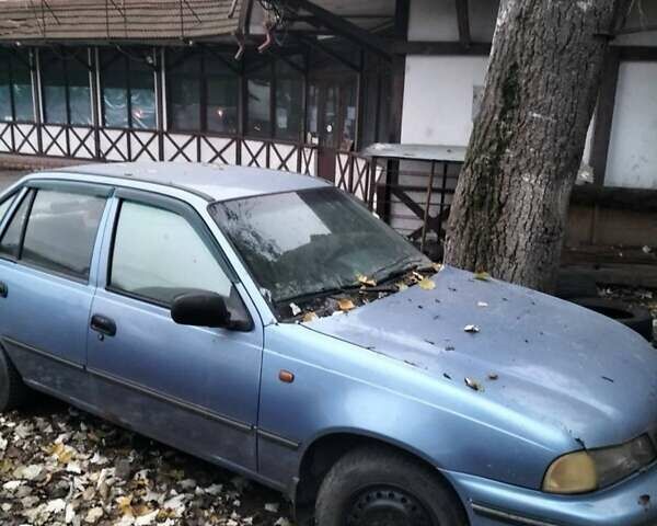 Синій Деу Нексія, об'ємом двигуна 1.5 л та пробігом 186 тис. км за 950 $, фото 3 на Automoto.ua