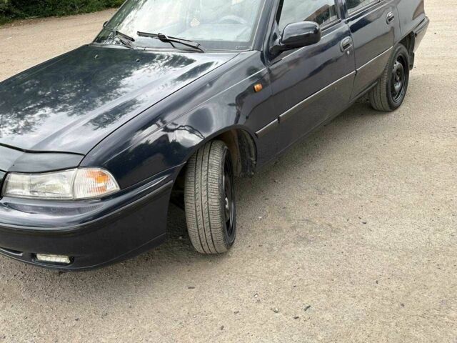 Синій Деу Нексія, об'ємом двигуна 1.5 л та пробігом 120 тис. км за 2750 $, фото 2 на Automoto.ua