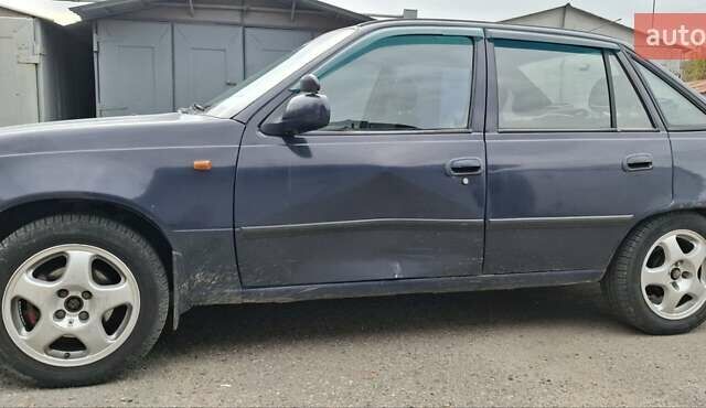 Синий Дэу Нексия, объемом двигателя 1.5 л и пробегом 159 тыс. км за 1150 $, фото 17 на Automoto.ua
