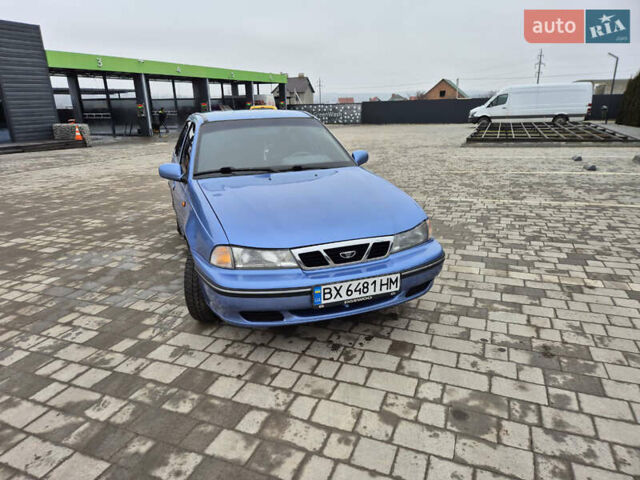 Синий Дэу Нексия, объемом двигателя 1.5 л и пробегом 242 тыс. км за 1999 $, фото 6 на Automoto.ua