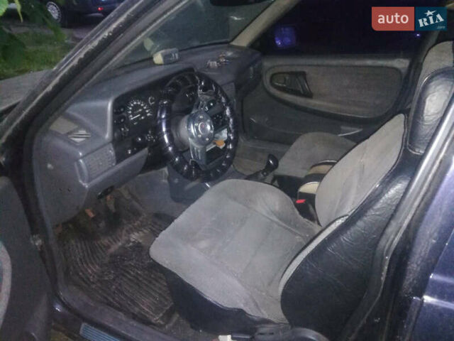 Синий Дэу Нексия, объемом двигателя 1.5 л и пробегом 170 тыс. км за 3000 $, фото 6 на Automoto.ua