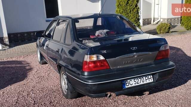 Синій Деу Нексія, об'ємом двигуна 1.5 л та пробігом 218 тис. км за 1650 $, фото 12 на Automoto.ua