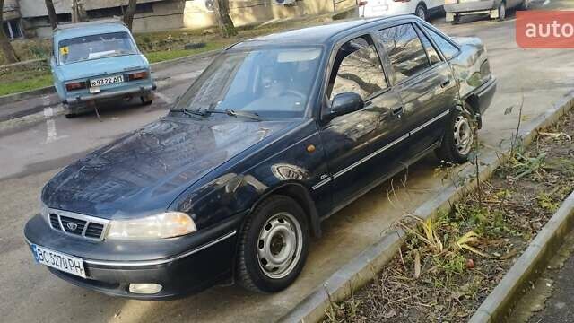 Синий Дэу Нексия, объемом двигателя 1.5 л и пробегом 218 тыс. км за 1480 $, фото 3 на Automoto.ua