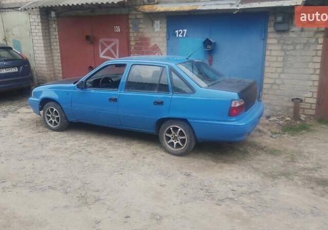 Синий Дэу Нексия, объемом двигателя 1.6 л и пробегом 200 тыс. км за 1600 $, фото 1 на Automoto.ua