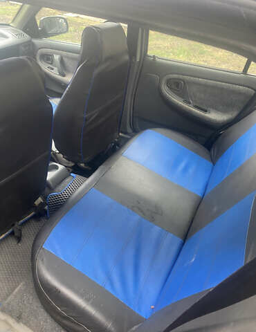 Синій Деу Нексія, об'ємом двигуна 1.5 л та пробігом 120 тис. км за 2250 $, фото 3 на Automoto.ua