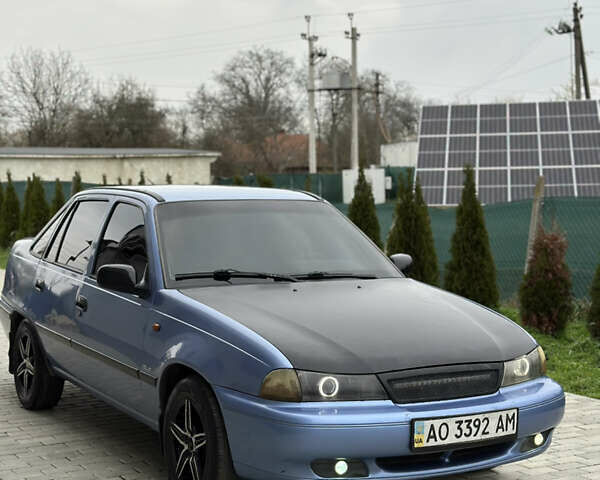 Синій Деу Нексія, об'ємом двигуна 1.5 л та пробігом 250 тис. км за 1500 $, фото 2 на Automoto.ua