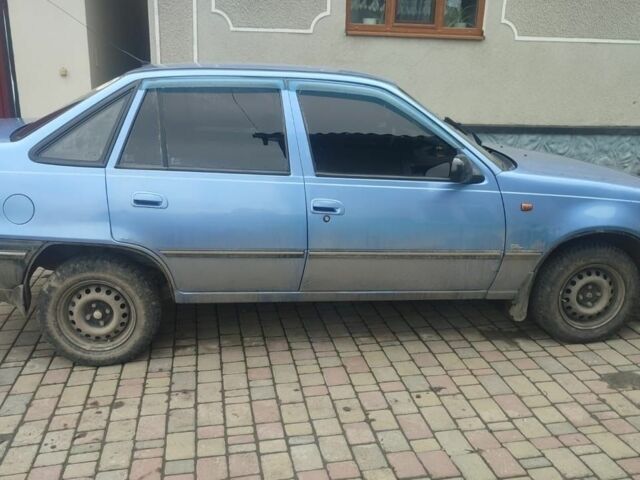 Синій Деу Нексія, об'ємом двигуна 1.5 л та пробігом 270 тис. км за 1500 $, фото 2 на Automoto.ua