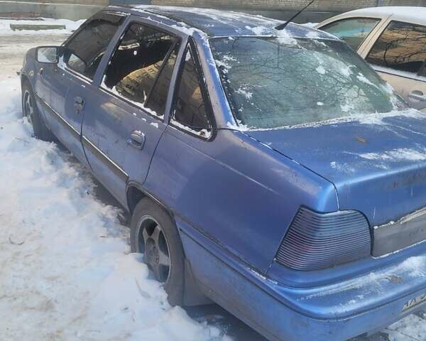 Синий Дэу Нексия, объемом двигателя 1.5 л и пробегом 200 тыс. км за 400 $, фото 4 на Automoto.ua