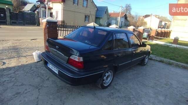 Синий Дэу Нексия, объемом двигателя 1.5 л и пробегом 218 тыс. км за 1300 $, фото 2 на Automoto.ua