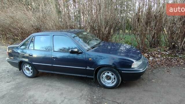 Синій Деу Нексія, об'ємом двигуна 1.5 л та пробігом 218 тис. км за 1650 $, фото 4 на Automoto.ua