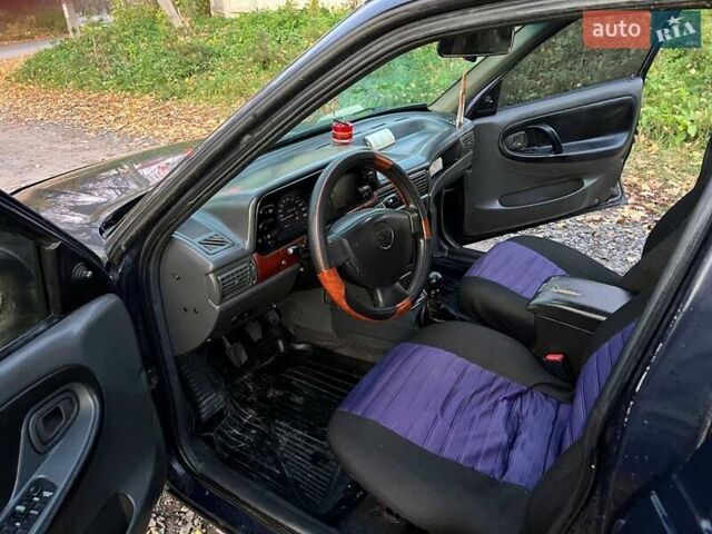Синий Дэу Нексия, объемом двигателя 1.5 л и пробегом 142 тыс. км за 2350 $, фото 3 на Automoto.ua