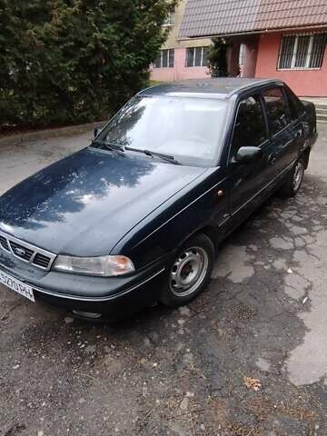 Синій Деу Нексія, об'ємом двигуна 1.5 л та пробігом 218 тис. км за 1650 $, фото 1 на Automoto.ua