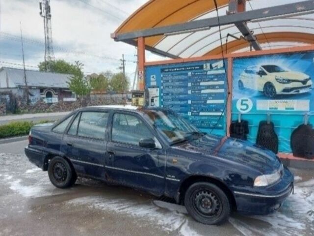 Синий Дэу Нексия, объемом двигателя 1.5 л и пробегом 355 тыс. км за 550 $, фото 3 на Automoto.ua