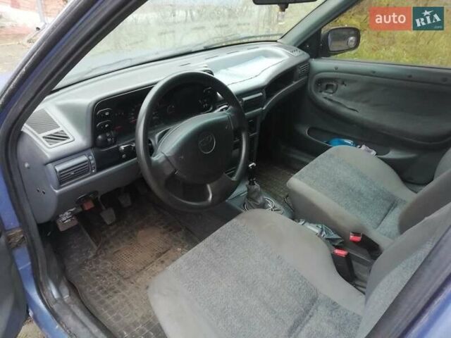 Синий Дэу Нексия, объемом двигателя 1.5 л и пробегом 190 тыс. км за 1500 $, фото 4 на Automoto.ua