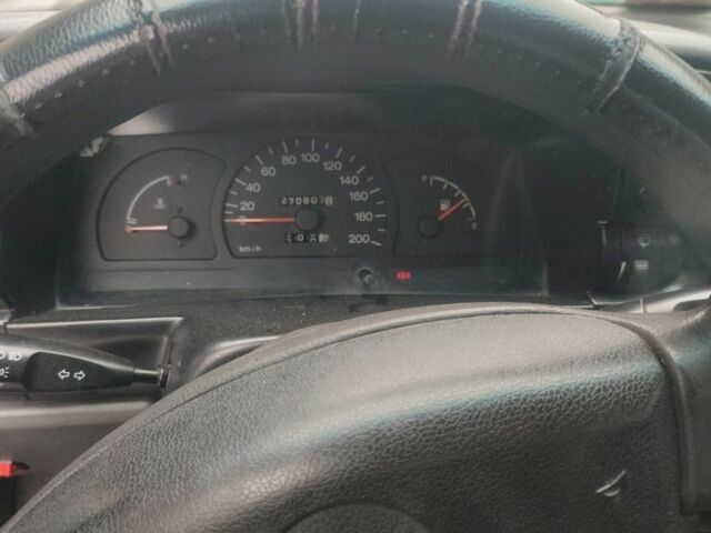 Синій Деу Нексія, об'ємом двигуна 1.5 л та пробігом 270 тис. км за 1500 $, фото 6 на Automoto.ua