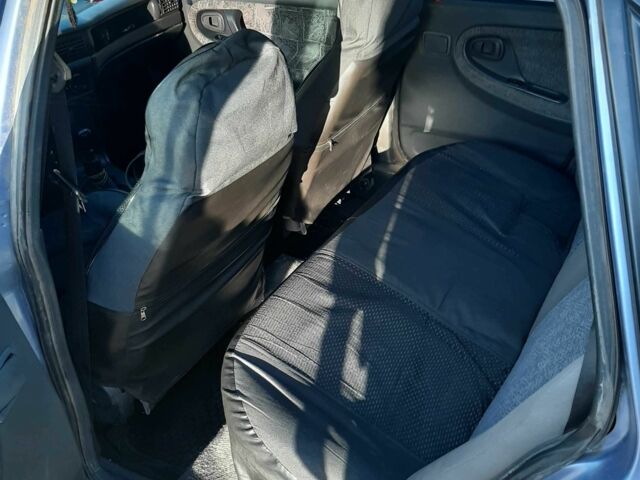 Синий Дэу Нексия, объемом двигателя 1.6 л и пробегом 230 тыс. км за 1100 $, фото 3 на Automoto.ua