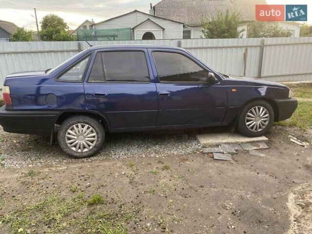 Синий Дэу Нексия, объемом двигателя 1.5 л и пробегом 260 тыс. км за 950 $, фото 4 на Automoto.ua