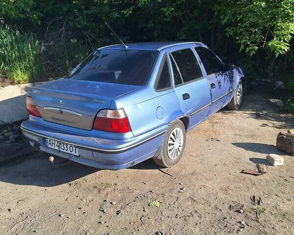 Синий Дэу Нексия, объемом двигателя 1.5 л и пробегом 150 тыс. км за 2000 $, фото 1 на Automoto.ua