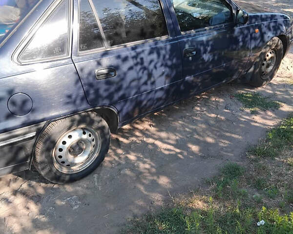 Синий Дэу Нексия, объемом двигателя 1.5 л и пробегом 205 тыс. км за 2100 $, фото 2 на Automoto.ua