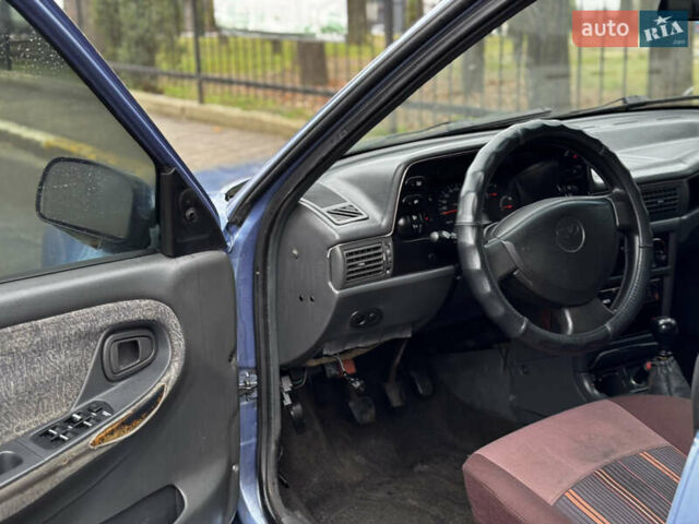 Синій Деу Нексія, об'ємом двигуна 1.5 л та пробігом 200 тис. км за 1050 $, фото 10 на Automoto.ua